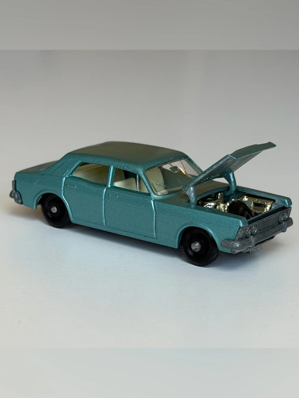 Vintage Matchbox No. 53 Ford Zodiac MK. IV Metallic Blue Opening Hood Lesney